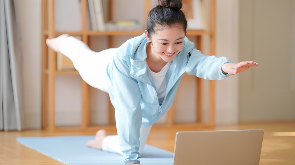 woman-doing-online-yoga-at-home.jpg